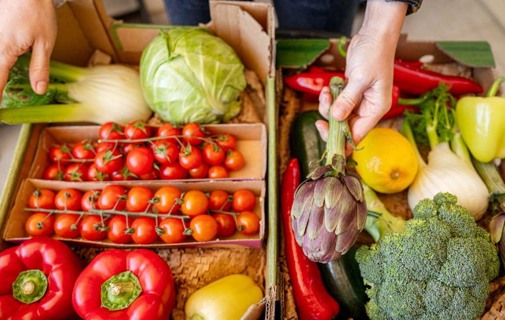 Kshetriva Farms delivery box loaded with fresh, preservative-free vegetables